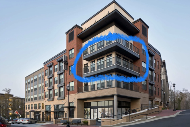 Massive window allows for beautiful view of downtown Clemson - Earle Apartments