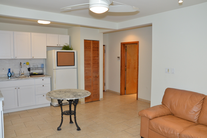 Living room - Charming Garden Apartment in the heart of North Coral Gables--for UM and FIU students