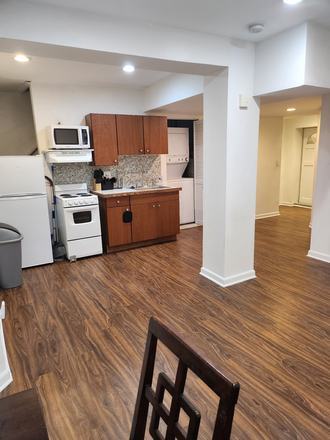 Open floor plan with laminent wood flooring thru out - Furnished 1 bedroom apt all utilities included