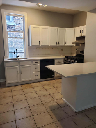 kitchen with island - 5 bedrooms, 3 baths in the heart of Pilsen House