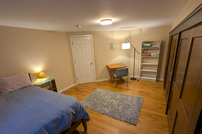 Bedroom - Primary Furnished Bedroom in 2 Bedroom Unit: Wood floors, Utilities Included!