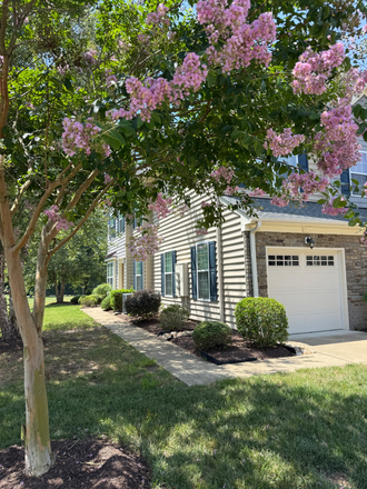 Exterior - Garage with side entrance - Golf Course Tranquility — Effortless One-Level Living with attached Garage in Williamsburg