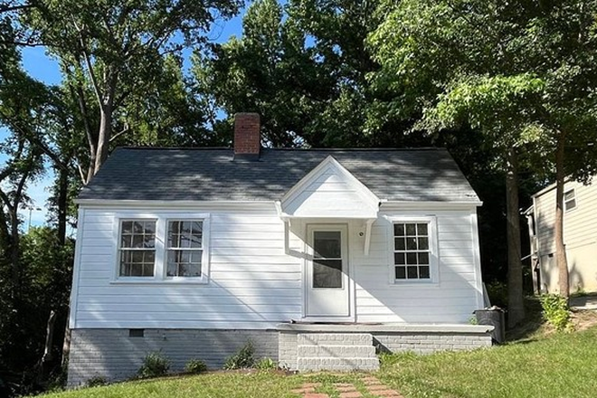 Outside street view - Sunny 2BR/2BA Corner-Lot Home Near Downtown Durham, Duke Hospital, NCCU & Hillside Park