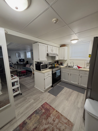 kitchen and living room - Truly best location! Recently renovated. New applicances!