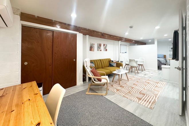 Living area - 44 Woodbine all inclusive studio Apartments