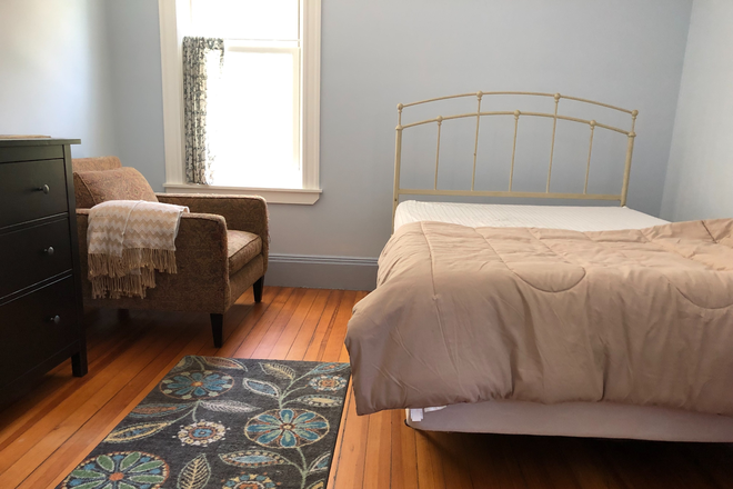 yr furnished bedroom (partial view) - JP CONDO TO SHARE $1400/month + 1/2 utilities (gas & electric)