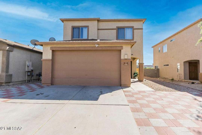 A spacious multi-story home floor plan featuring a kitchen, two distinct living rooms, and 3.4 bathrooms. - Elijah House