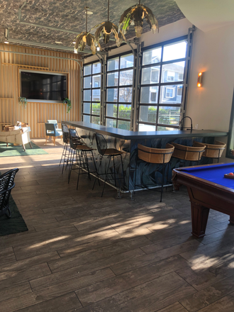 Pool table in lounge area - The Landing Apartments