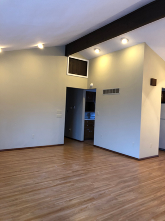 Nice can lighting in living room. - Large 2 bedroom 1 bath apartment with lots of storage in great location!