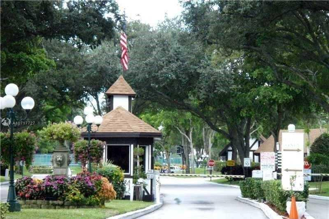 gated 2/7 security - International village- Gated, resort like complex Condo