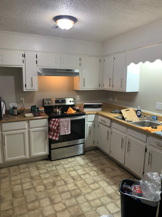 kitchen with a dishwasher and an oven - UA Students: Private Rooms 5 Min from Campus | Suites From $600 – Aug Move-In