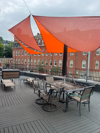 Deck off living room - One Elmwood - "This furnished second-floor apartment has Three Bedroom