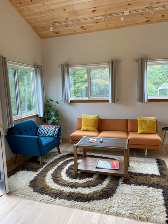 main floor open living/dining/kitchen - Gorgeous modern house in the woods available now / Spring semester (rent includes utilities)