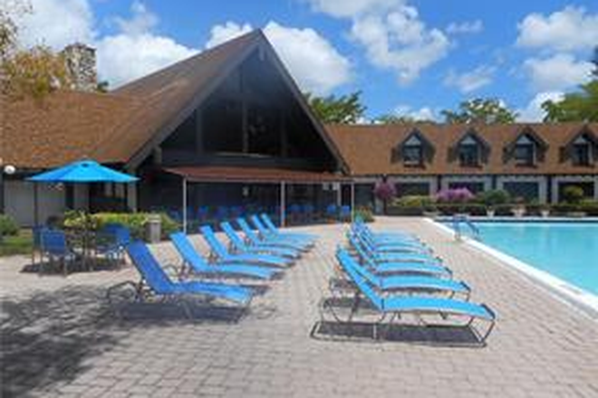 large outside pool - International village- Gated, resort like complex Condo