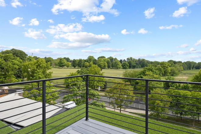 Roof top view - 2024-built 4BR + den/3.5BA Townhome w/ Rooftop Deck and golf course views – 7-Min Walk to metro