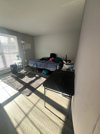 The living room space - Boulders Apartment, opposite the 31 bus stop