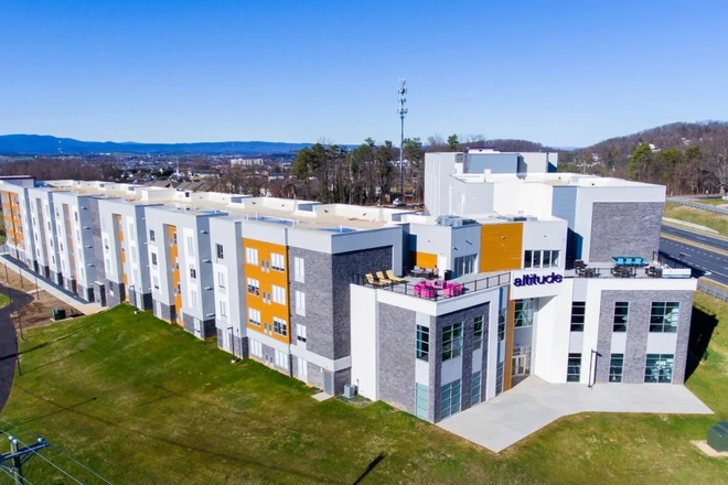 Apartment Building with Rooftop Deck and Lounge - The Altitude Apartments