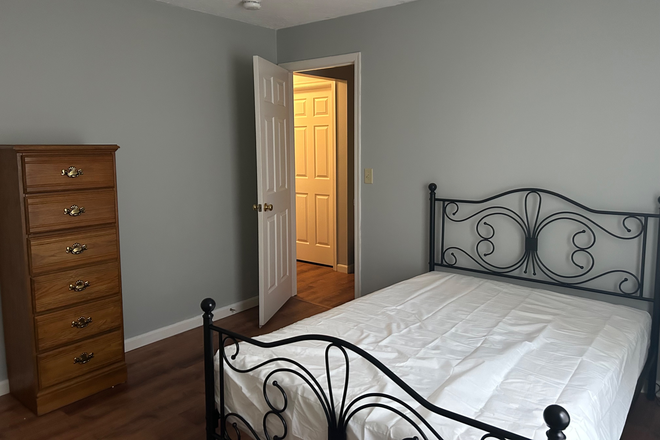 Bedroom - Furnished bedroom four bedroom, two bath condo only a few minutes away from campus