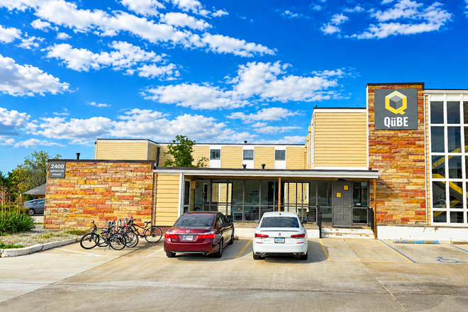 Front VIew of Building - Qube Apartments (Studio)