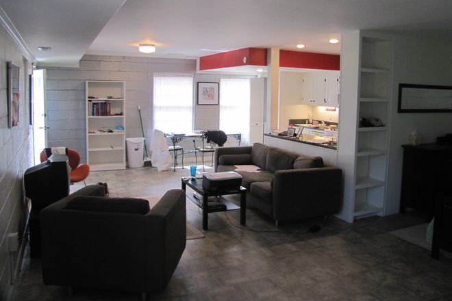 Sitting, dining and kitchen area - Studio Apartment in Exchange for Part-time Personal Caregiving