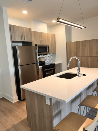 Kitchen - Discovery Housing Apartments for Graduate Students *Newly Built*