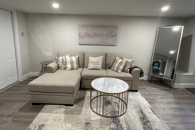 Living room - Available Soon: Renovated 1-Bedroom Basement Apartment Near Stony Brook – Utilities Included!