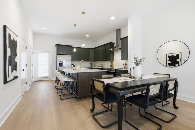 Open kitchen/dining area - Brand-New 4BR/3.5BA Townhome | 10 Min to VUMC & Campus | Dedicated Parking