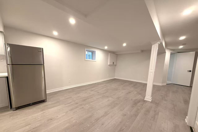 A Spacious Living Room - Newly Renovated Basement, Private Kitchen & Bathroom, All Utilities Included, Available Now House