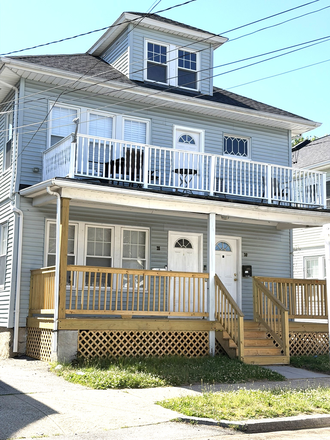 Front of House- driveway to 2 car parking is on the left - Spacious 3 bed, 1.5 bath w/laundry & parking