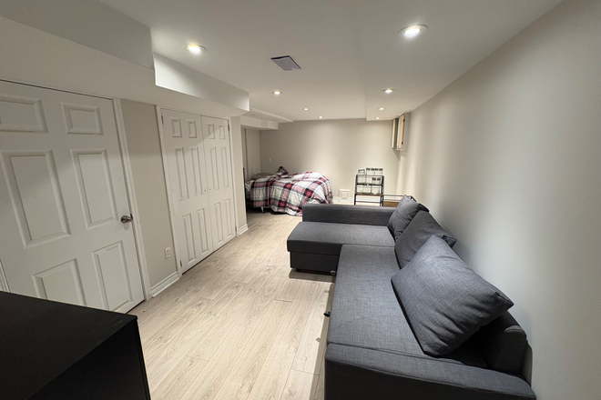 Living space - Clean and Cozy Basement Apartment located walking distance to Geary Ave!