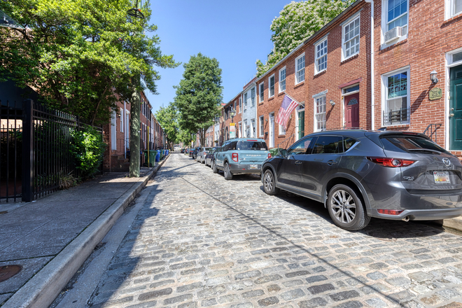 Historic cobblestone street - Ridgley's Delight Row House