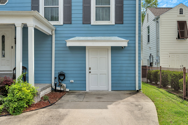 Driveway entrance (driveway space included) - 2 bedroom ground level unit, all utilities included! Duplex