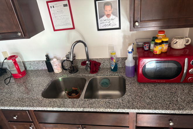 Kitchen Sink and some Appliances - The Addison on Main, One Bedroom One Bathroom Apartment 10 Minute Drive from Campus