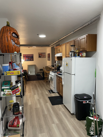 Kitchen and common room - Apartment Sublet with Desk, Dresser, and Bed Included in Fenway (10min walk from campus)