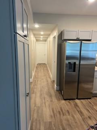 hallway - Completely Remodeled 4 plex. 5 bedroom and 3 bedroom units avail. Close to Campus Triplex