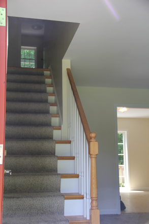 stairs to second floor - 4 bedroom single family house with 2 car attached garage