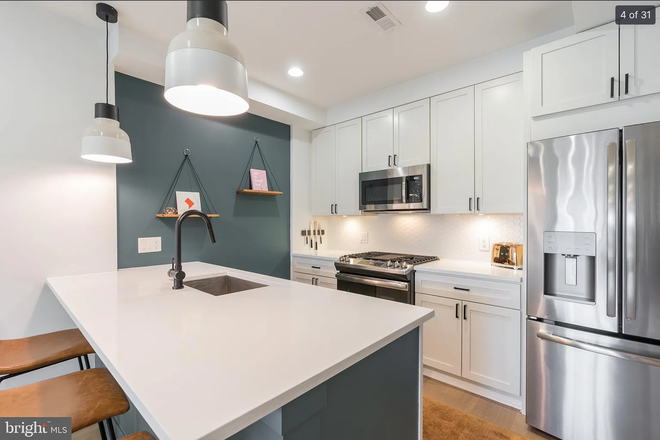 Kitchen - Light-filled 2 bed/2 full bath unit in excellent location right next to CUA Condo