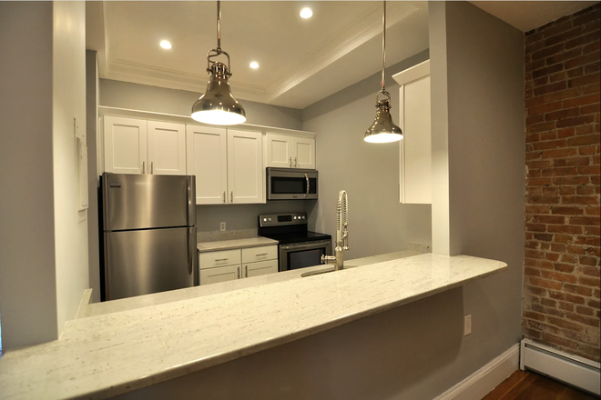 Fridge, electric stove top, oven, and microwave - Summer 1 sublet Apartments