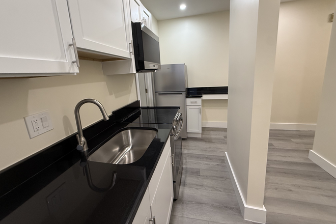 Kitchen - Beautiful New Studio located on Burbank St Available for Short or Long Term Lease!! Apartments