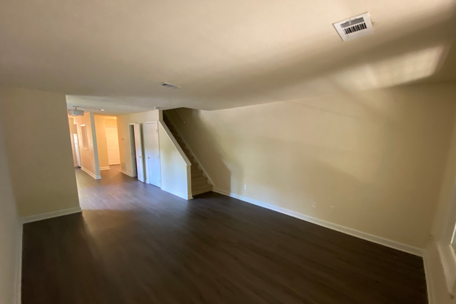 Living Room and stairs to the upstairs - "Avery Close " condos room available across from Centennial Campus NCSU NC State Raleigh