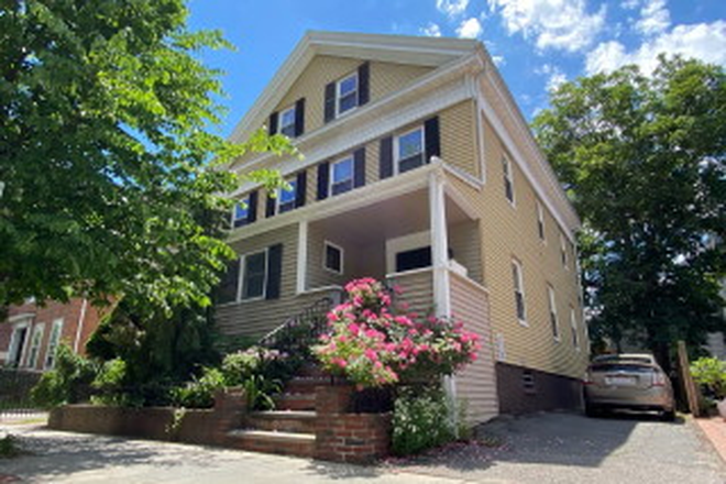 Street view of building - 3 BR, central AC, one bath duplex