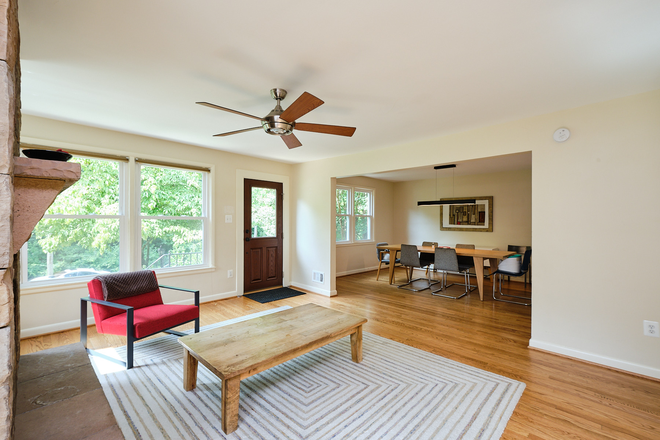 . - Gorgeous Brookland home with a gourmet kitchen, enormous backyard with patio, and fireplace