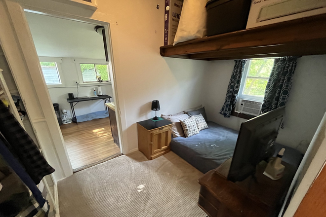 Bedroom with lofted area - Historic 1BR Duplex with HUGE Private Fenced Yard, Parking & Deck – Goss/Grove Duplex