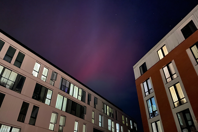 Outside view of the apartment complex during the Northern Lights - 11 East Pleasant Apartment