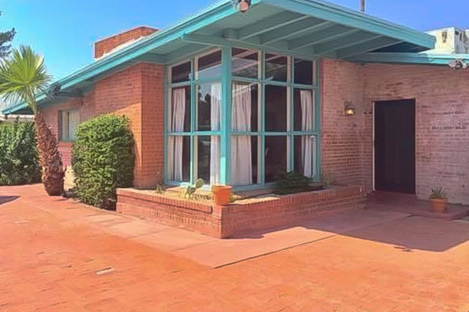 Living Area seen from front courtyard. - Walled Courtyard Home with Diving Pool