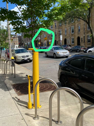 Outside view of the bus stop and the T-line - It is 20 minutes from campus and the apartment is right across the T- line and the bus stop.