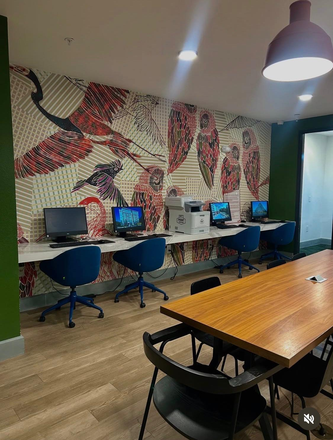 Business center and printing area - The Aves at Twelve 100, across the street from UCF Apartments