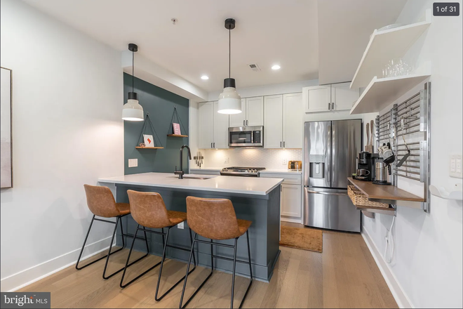 Kitchen - Light-filled 2 bed/2 full bath unit in excellent location right next to CUA