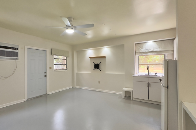 TV area - Living - Spacious Studio w/ patio. Private entrance in quiet neighborhood. Includes electric, water and Wifi