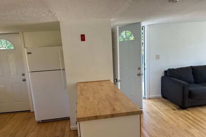 View is coming out of the bedrooms, toward the kitchen, living room - B< LLC 2nd floor apartment, next door to Mansfield Drive Inn